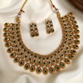 Tanvi Antique Matte Gold Emerald Teardrop Choker Set